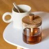 Bocal a miel avec cuillere