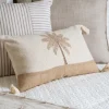 Coussin pompons palmier 50x30cm
