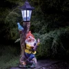 Nain de jardin avec lampadaire