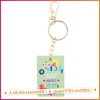 Porte cle en bois merci