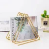 Porte revue metallique dore